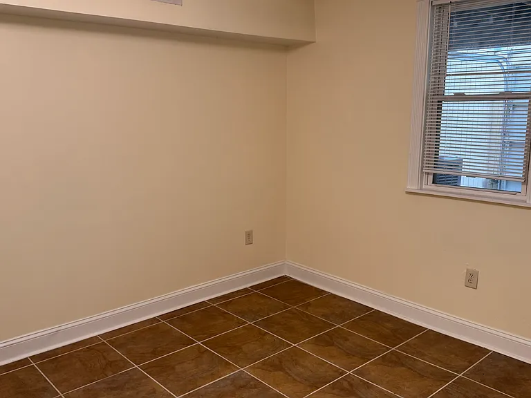 Large bedroom. Easily fits queen bed.