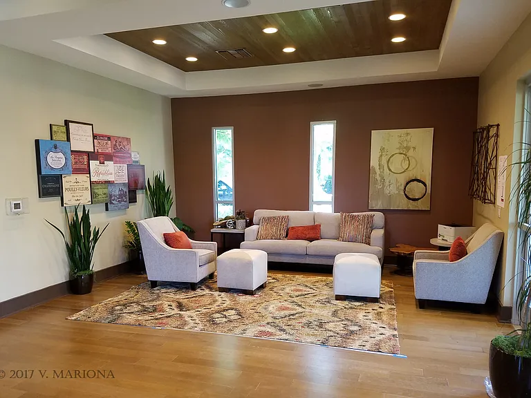 The wine room, one of three community rooms in the main amenities