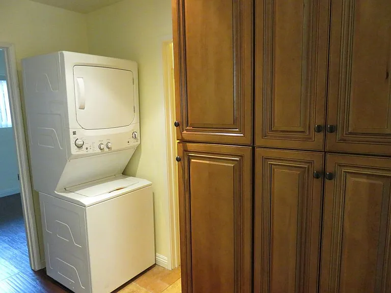 View of stacked washer and dryer.