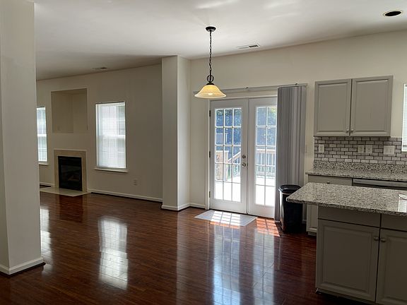looking toward kitchen, breakfast and a smidgeon of the family room