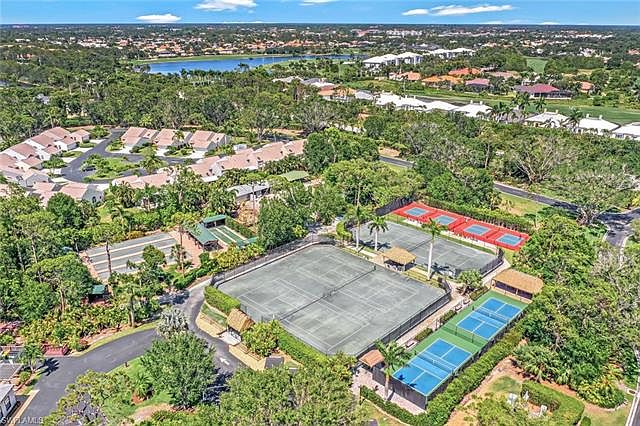 Clay tennis & pickle ball courts. Bacca & shuffleboard to left.