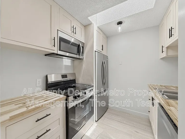 2835 S Monaco Pkwy #1-308 — Photo 5