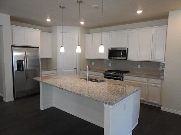 Kitchen with Stainless Steel Appliances, Walk In Pantry and large island.