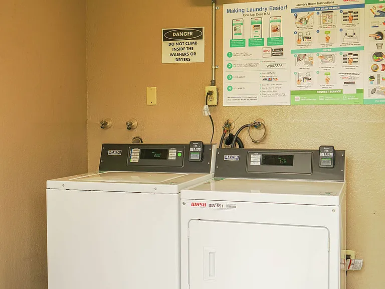 5 Laundry Rooms On-site