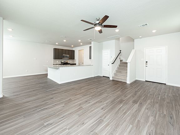 Family Room to Kitchen and Dining Area