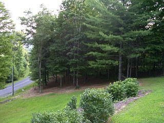 The yard is beautifully landscaped.