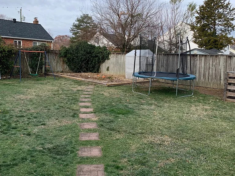 Back yard (two sheds, raised garden, six foot privacy fence)