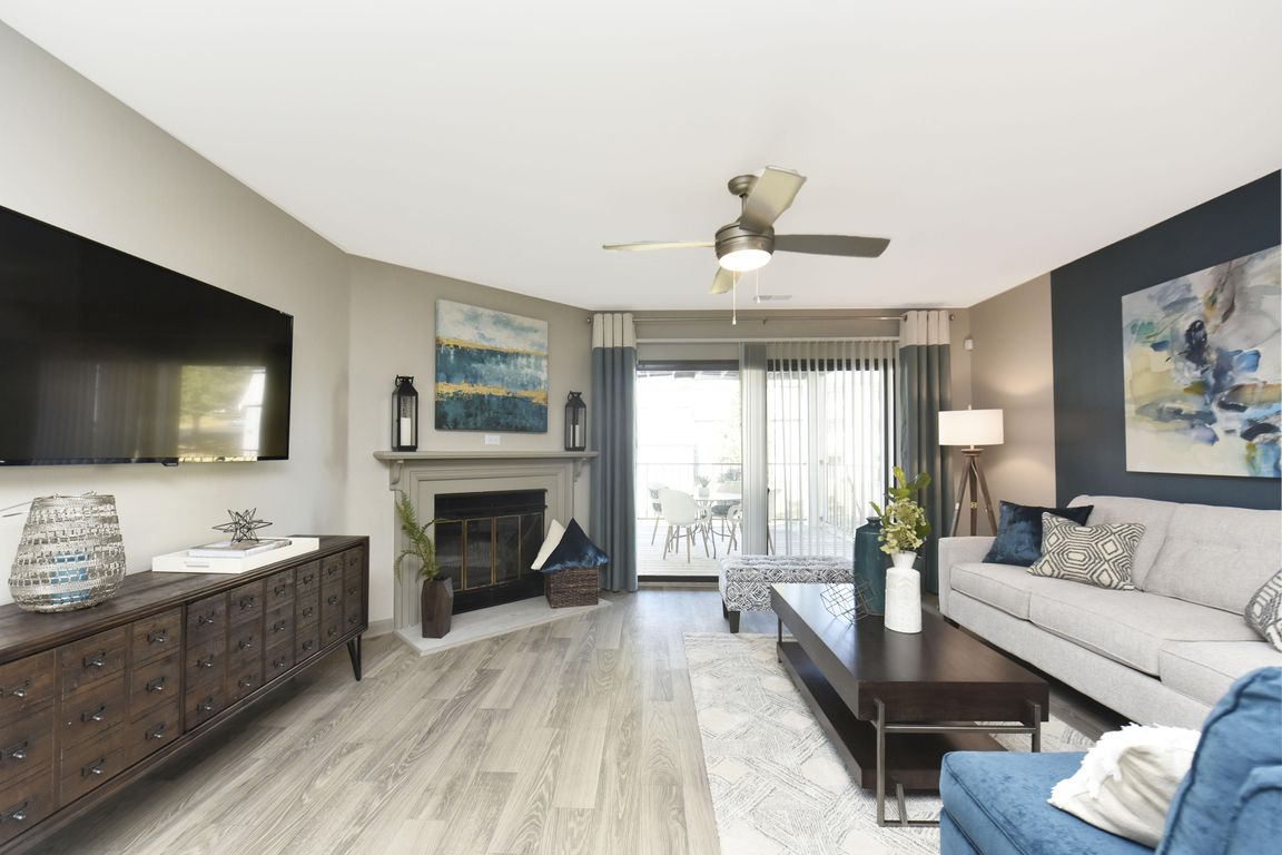 Spacious living room with hardwood-style flooring