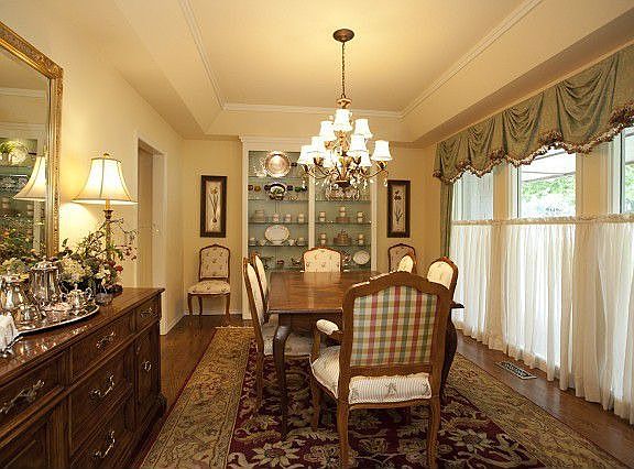 Formal dining room withhardwoods