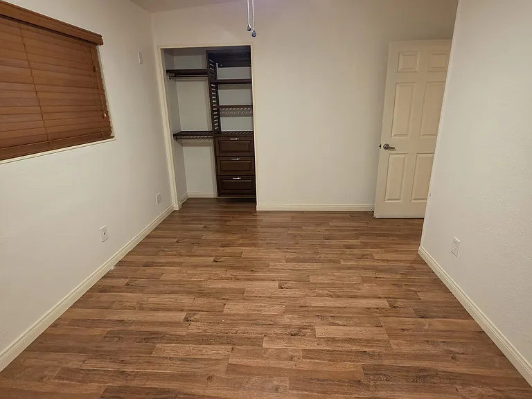 Bedroom next to side entrance