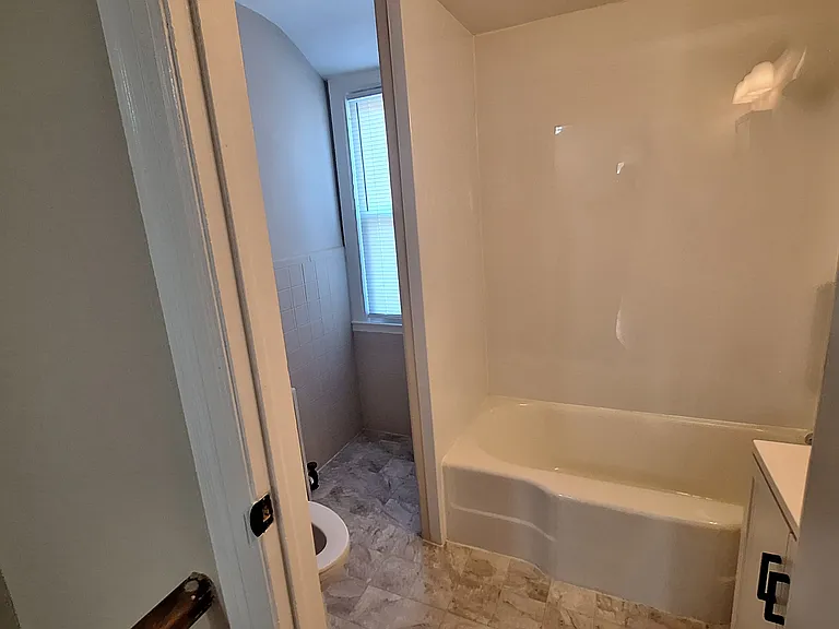 Updated Bath, window to Cottage Ave