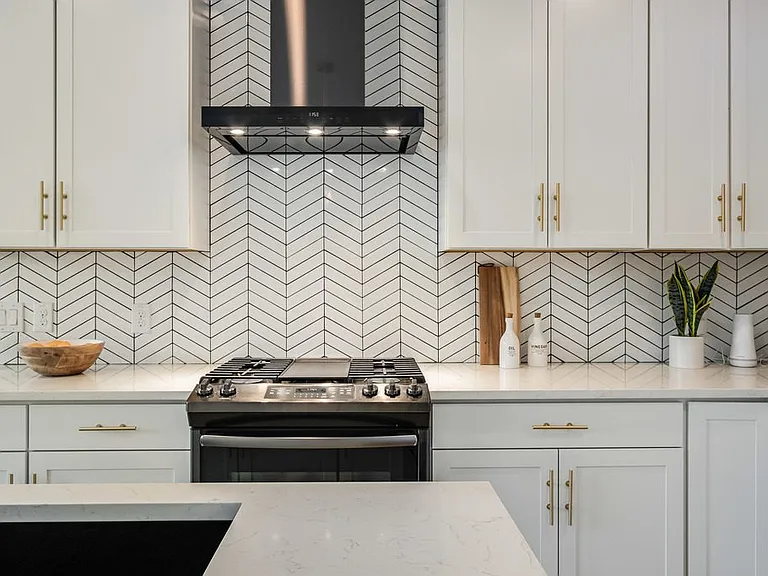 Main house kitchen with custom pull out shelving and walk in pantry