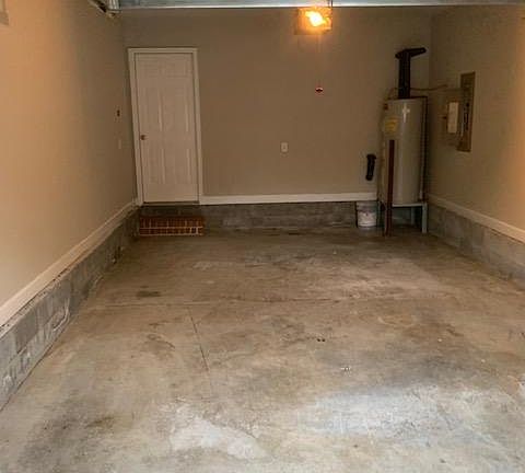 Deep garage with opener.