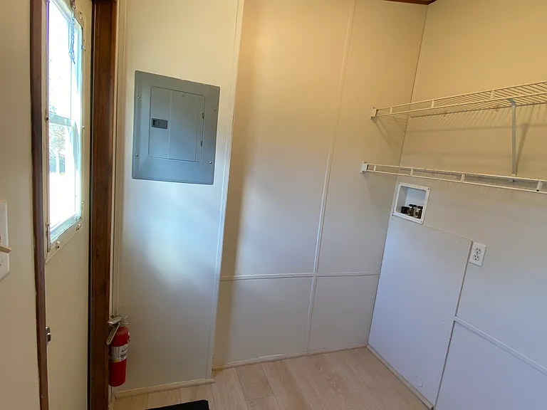 Separate laundry room area w/outdoor entrance.