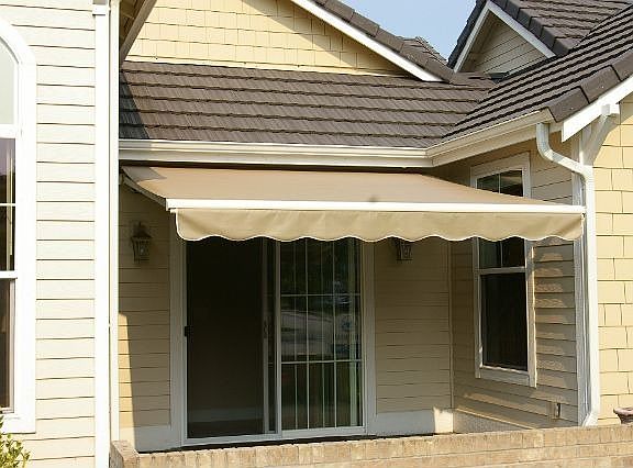 Retractable awning with remote for comfortable outdoor space