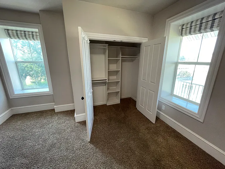Efficient closet storage for bedroom off the second floor landing.