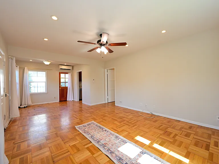 fully upgraded and bright w/ parquet hardwood flooring + mini split hvac + in-unit laundry