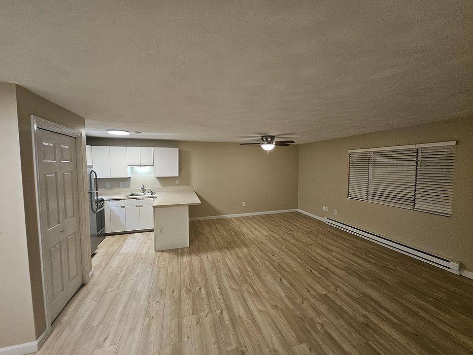 Updated kitchen with hardwood floors and an open floor plan; convenient washer & dryer in unit.