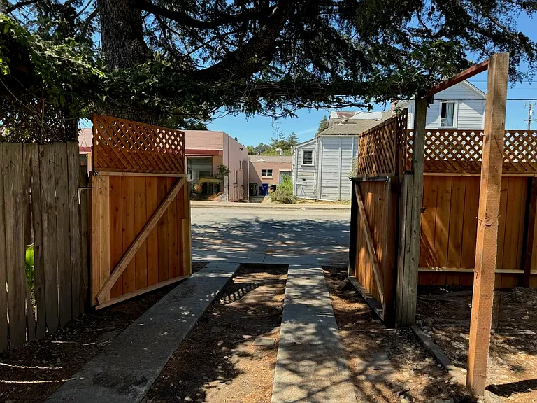 One additional parking space in the backyard, if needed. Access is from May Avenue.