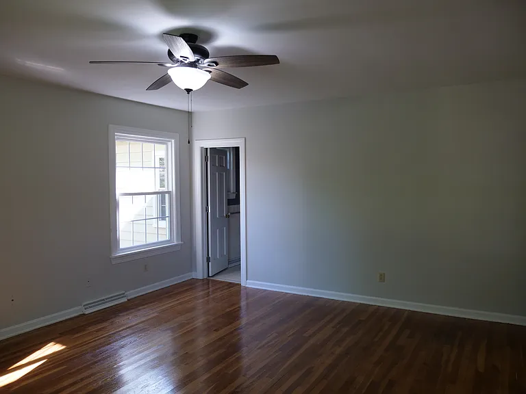 Master bedroom with attached full bathroom.