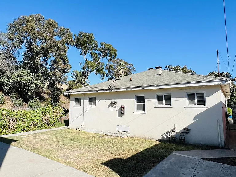 Large shared and fenced in backyard