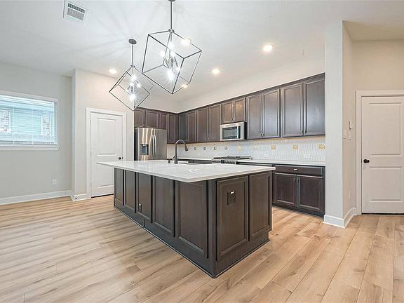 2nd image of 23722 Pullin Market Dr #1