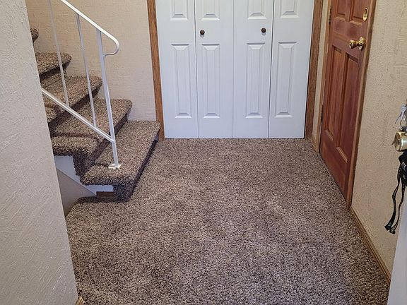 Entry to home with brand new carpet