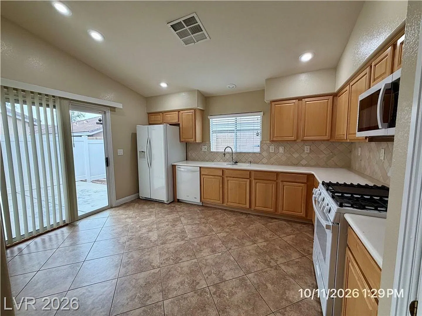 Charming 2-Bedroom Townhome with Covered Porch & Attached Garage — Photo 3
