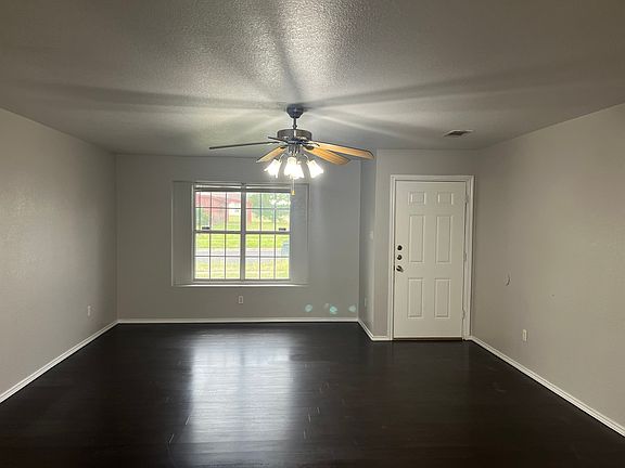 Living room looking toward front door.
