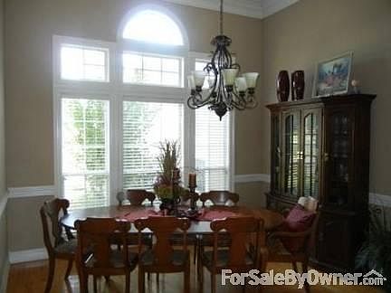 Dining Room
						:
						Large formal dining room with impressive 12 foot ceilings and beautiful windows
