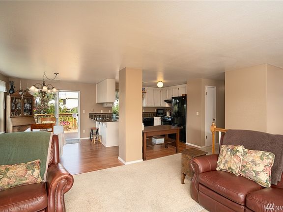 Open concept with wood burning fireplace!