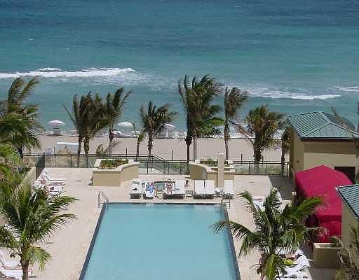 Swimming pool with attendants at beach too