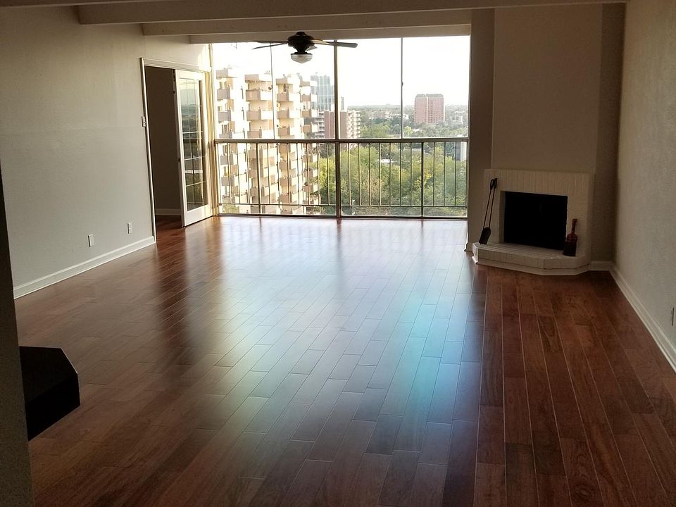 Living Room - closed in balcony, functioning fireplace, Brazilian redwood floors throughout