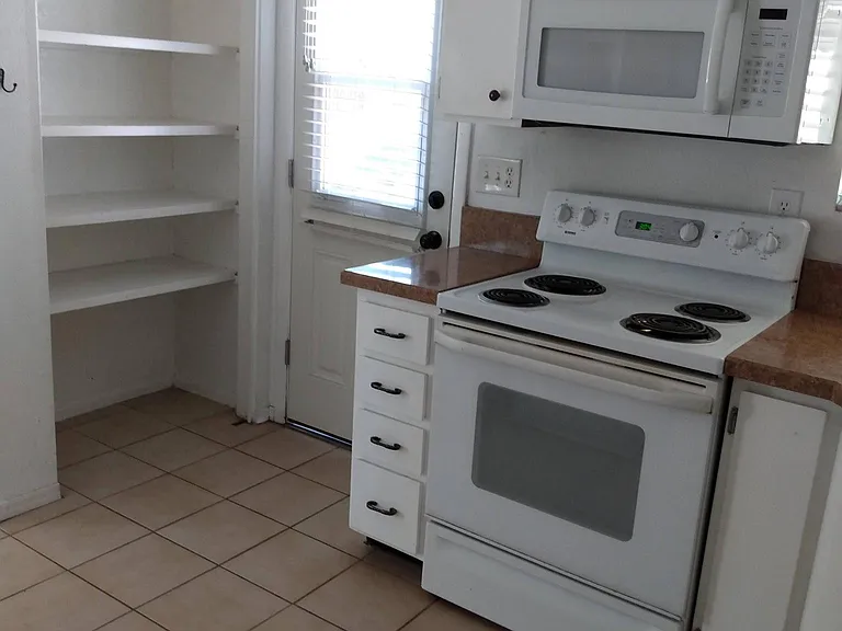 kitchen with large pantry cabinet