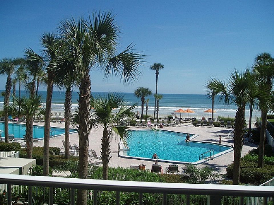 View of the pool and ocean from the balcony