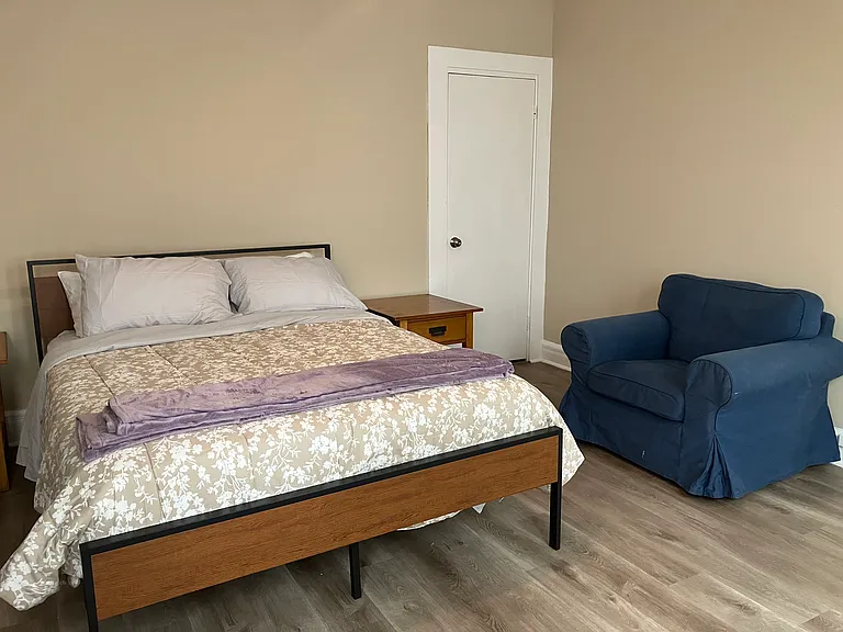 Large, fully furnished second bedroom with a new queen-size bed with a hybrid mattress