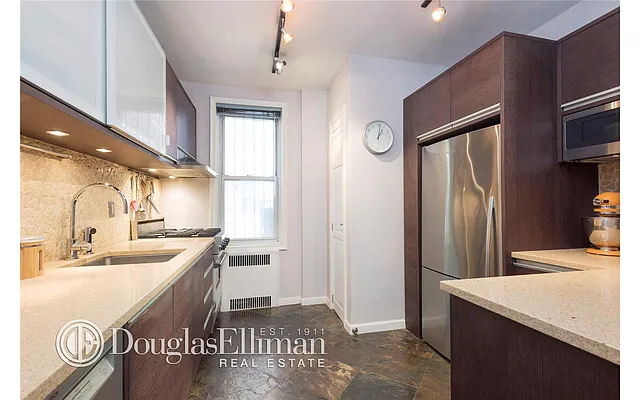 Sold by Douglas Elliman | media 11