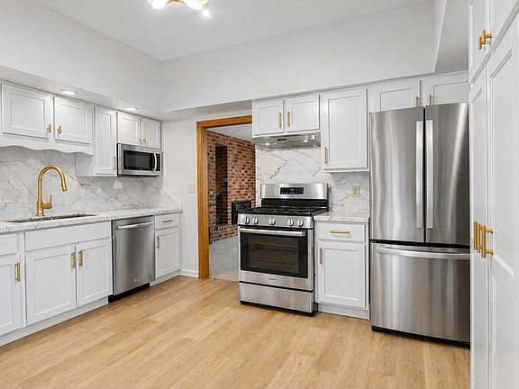 Kitchen. Has french doors to patio and back yard.