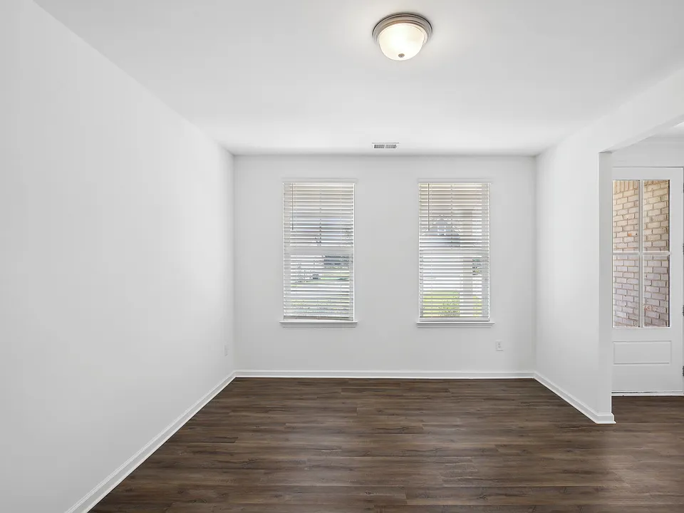 Hickory C Layout - Living room area and front door entry.