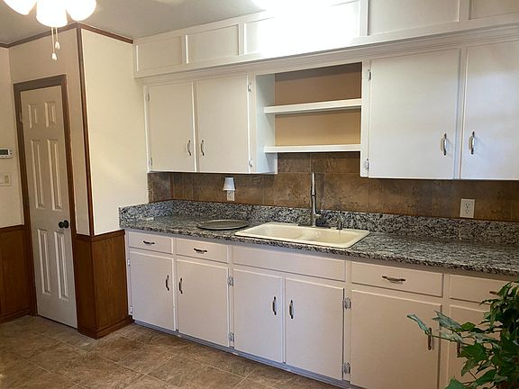 kitchen work space and water heater closet