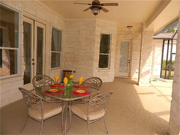 Breakfast on the veranda? You can have it all with this private setting! Over sized covered porch allows you huge entertaining possibilities!