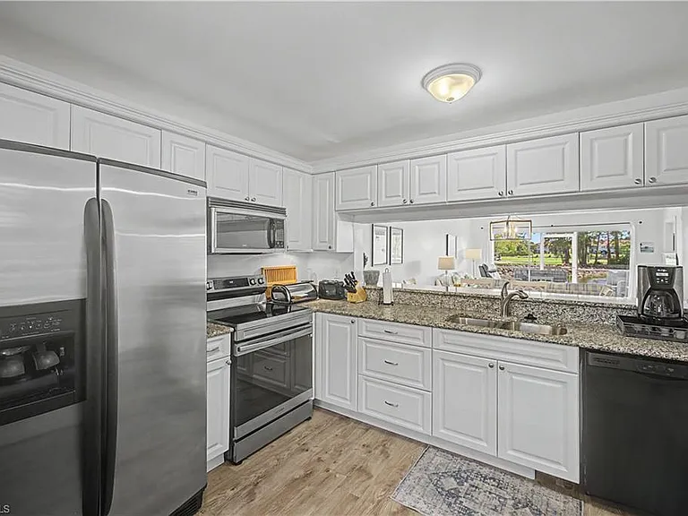 7065 Dennis Cir #F103 — Photo 4