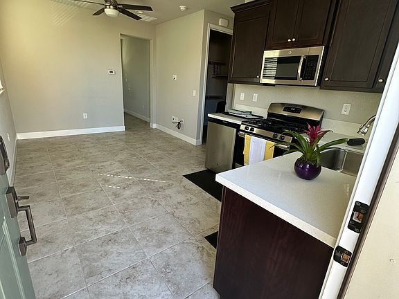 View from front door into kitchen and living room.