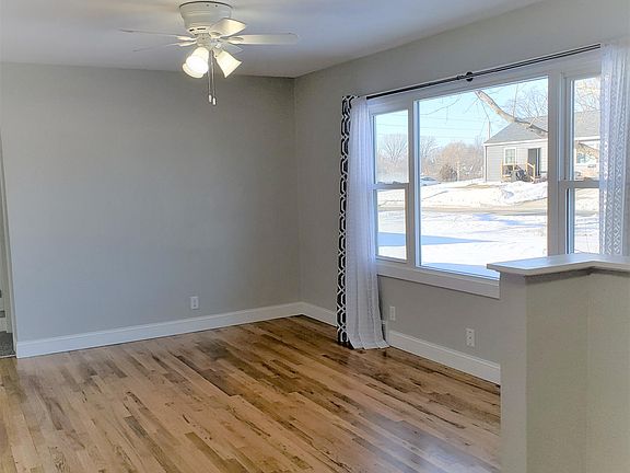 Large Living Room w/ Wood Floors and Beautiful Picture Window