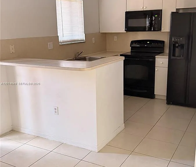 990 NE 33rd Ter #104 — Photo 13