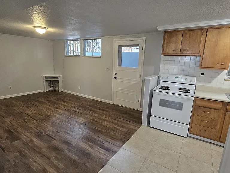 3885 1/2 S Acoma Open Living Room Kitchen View