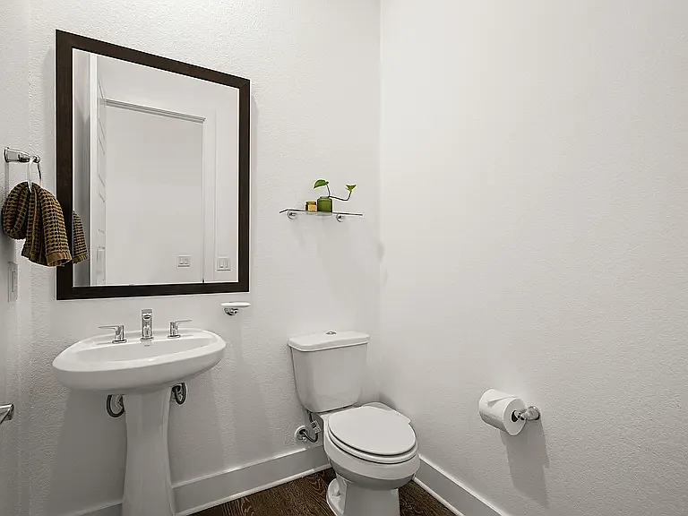 The main floor includes a convenient half bath for guests and is close to the private downstairs patio_perfect for morning coffee or evening gatherings.