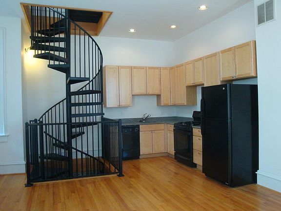 kitchen, showing spiral stairs