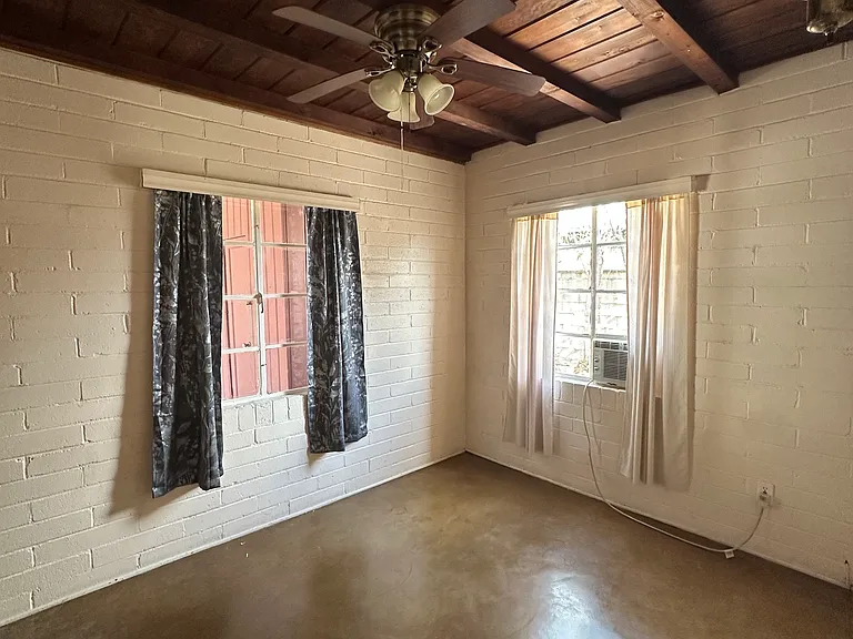 South Bedroom with ceiling fan and AC