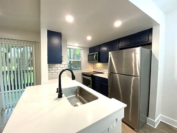 Stainless steel appliances in select units!